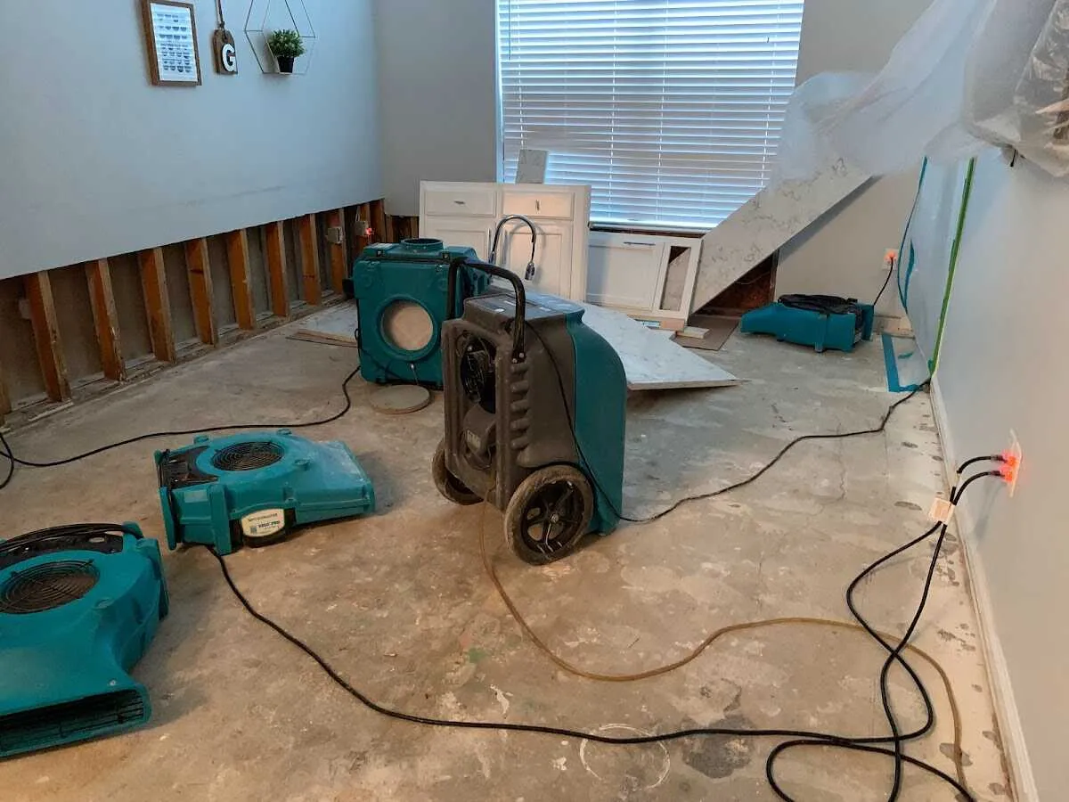 Dehumidifier in flood-cut room for Water Damage Restoration in Dundee